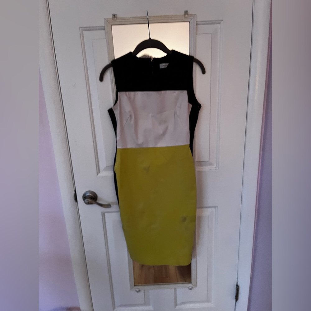 Calvin Klein mini dress
Block white green and black letters